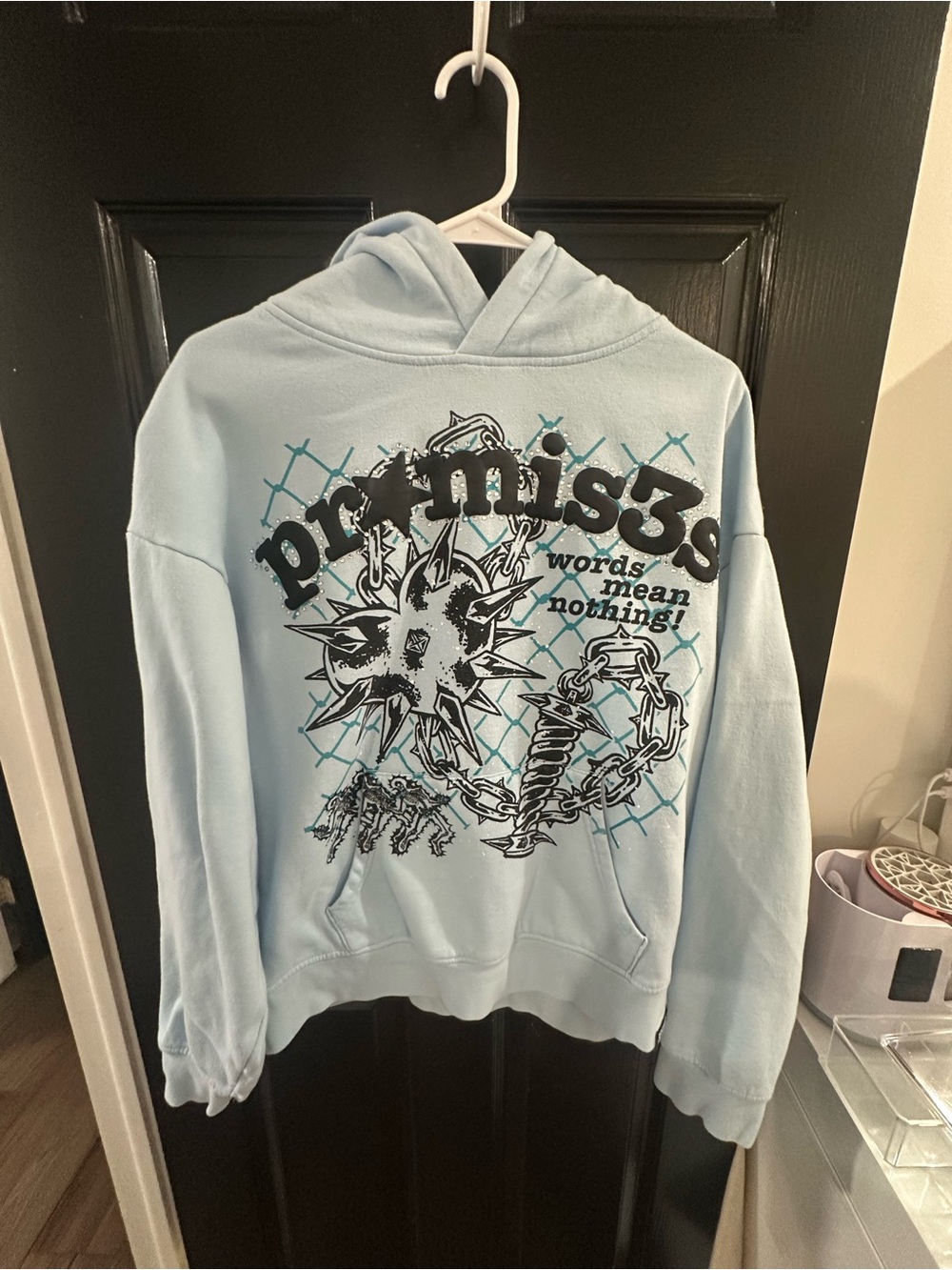 promises Light Blue Graphic Hoodie - 'words mean nothing'